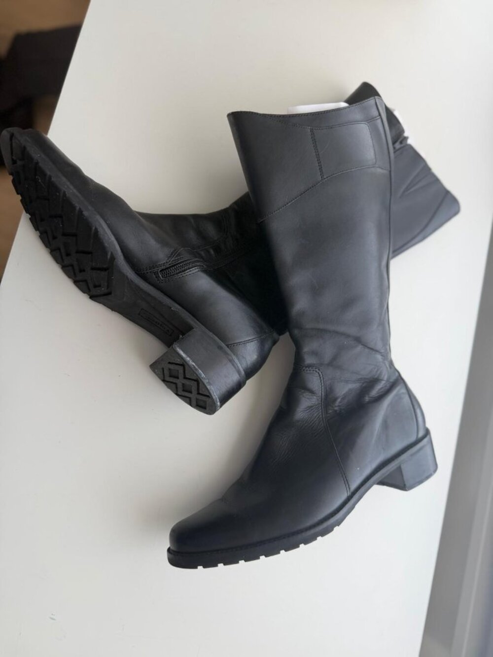 Made in Brazil authentic leather black mid calf boots.